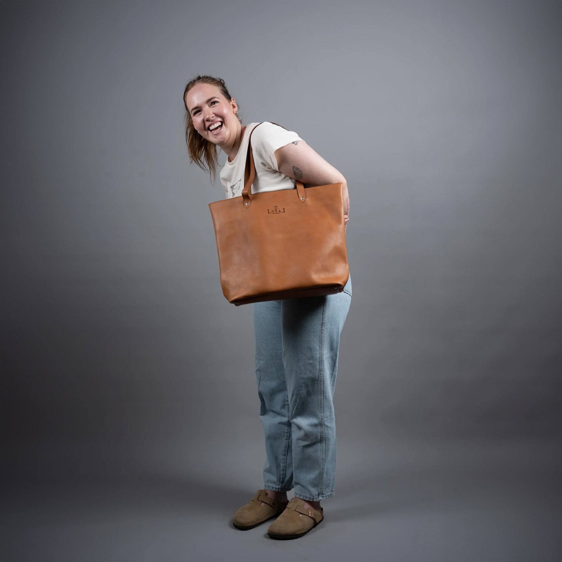 https://cdn.shopify.com/s/files/1/0746/9767/0945/files/rosatotetheloyalworkshopwomensethicalleather.jpg?v=1717156977