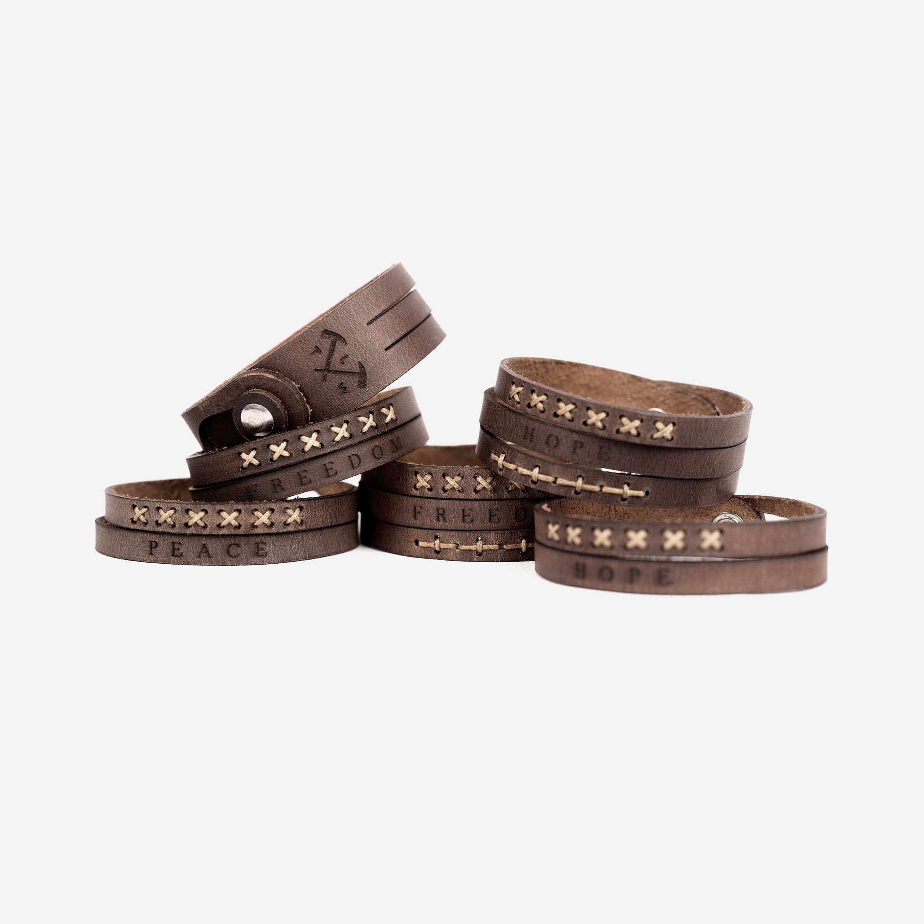 https://cdn.shopify.com/s/files/1/0746/9767/0945/products/the-loyal-workshop-Wristbands2.jpg?v=1683082876