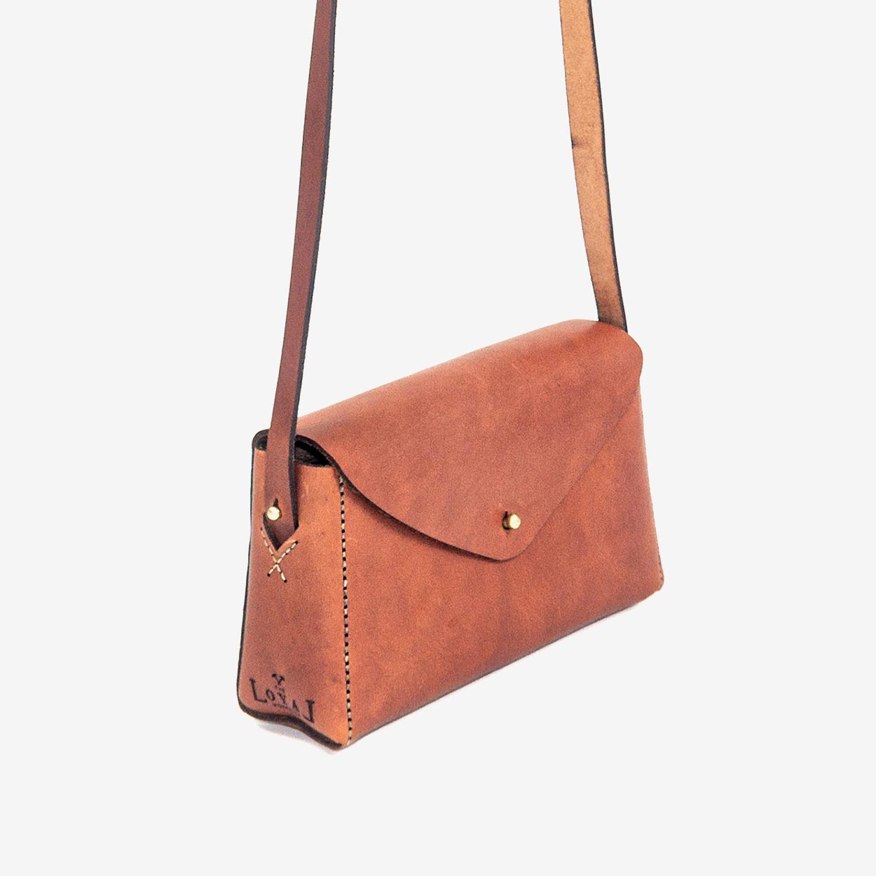 https://cdn.shopify.com/s/files/1/0746/9767/0945/products/the-loyal-workshop-ethical-leather-Dorthy-mini-06.jpg?v=1683082955