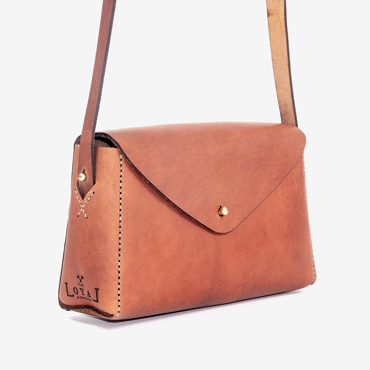 https://cdn.shopify.com/s/files/1/0746/9767/0945/products/the-loyal-workshop-ethical-leather-Dorthy-mini-07.jpg?v=1683082955