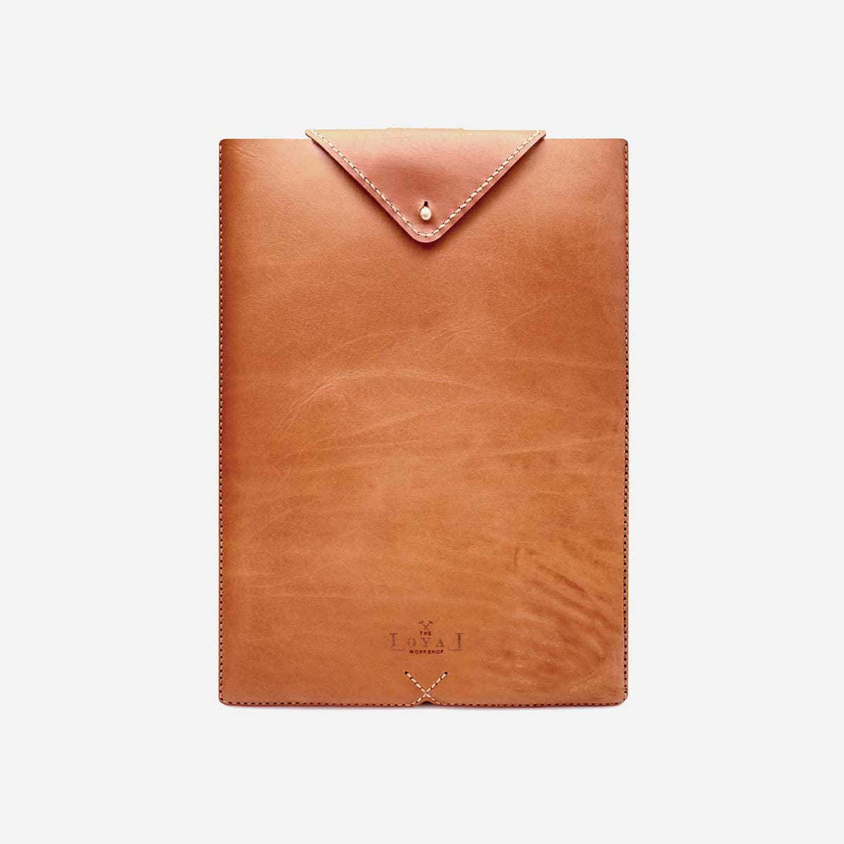 https://cdn.shopify.com/s/files/1/0746/9767/0945/products/the-loyal-workshop-ethical-leather-Laptop-Sleeve-Cognac-5.jpg?v=1683082823