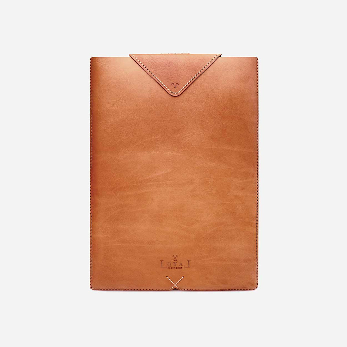https://cdn.shopify.com/s/files/1/0746/9767/0945/products/the-loyal-workshop-ethical-leather-Laptop-Sleeve-Cognac-6.jpg?v=1683082823