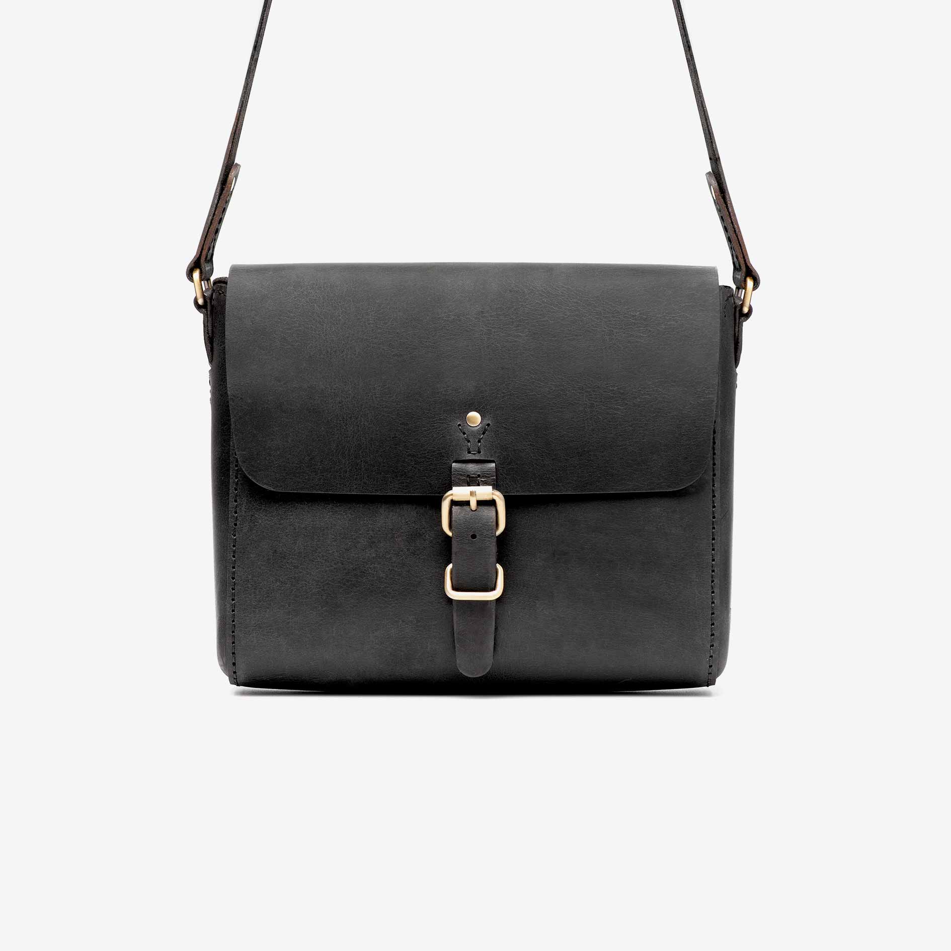 https://cdn.shopify.com/s/files/1/0746/9767/0945/products/the-loyal-workshop-the-companion-satchel-black-04.jpg?v=1683082792
