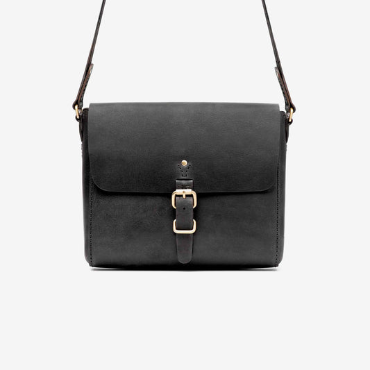 https://cdn.shopify.com/s/files/1/0746/9767/0945/products/the-loyal-workshop-the-companion-satchel-black-04.jpg?v=1683082792