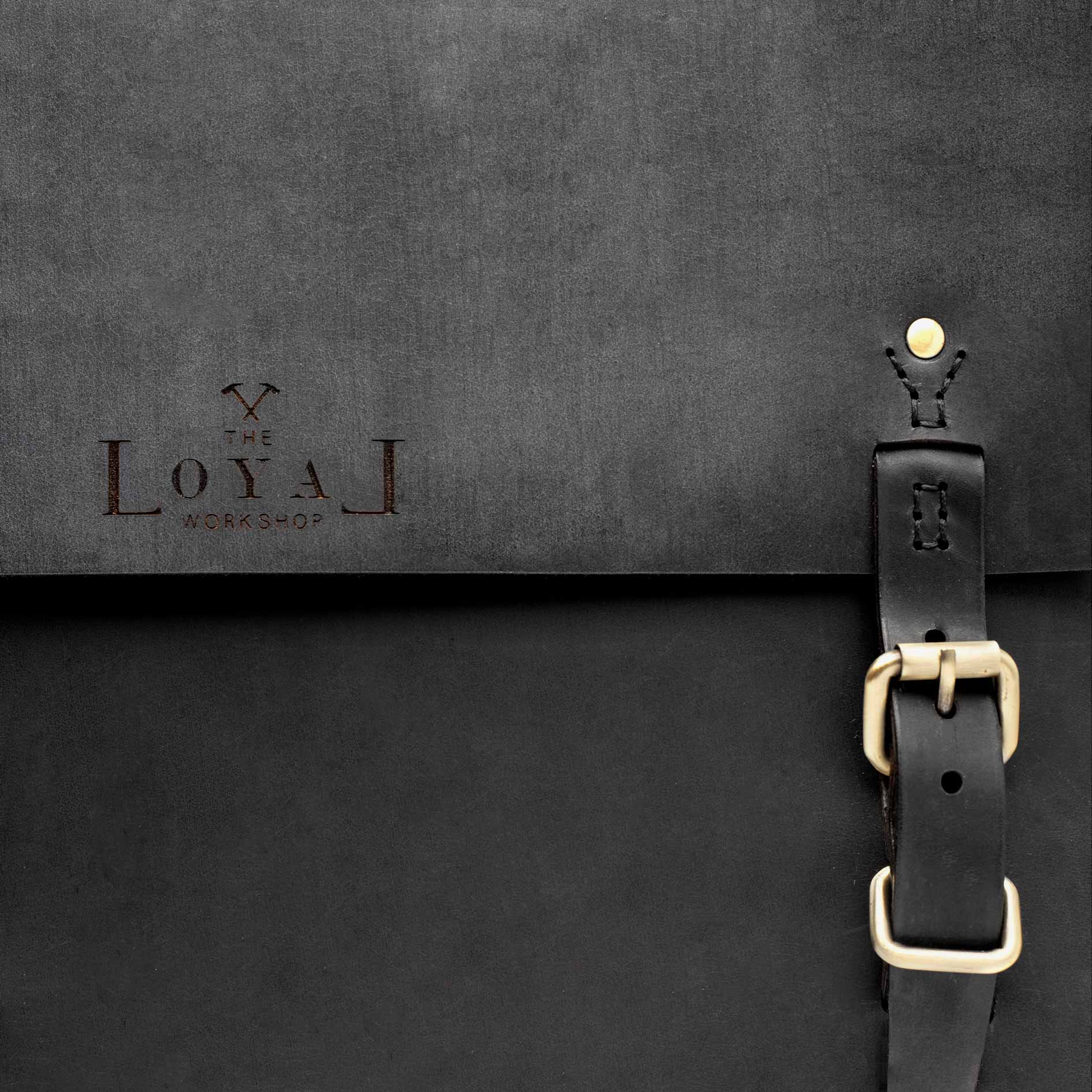 https://cdn.shopify.com/s/files/1/0746/9767/0945/products/the-loyal-workshop-the-goodstead-satchel-black-02.jpg?v=1717579450